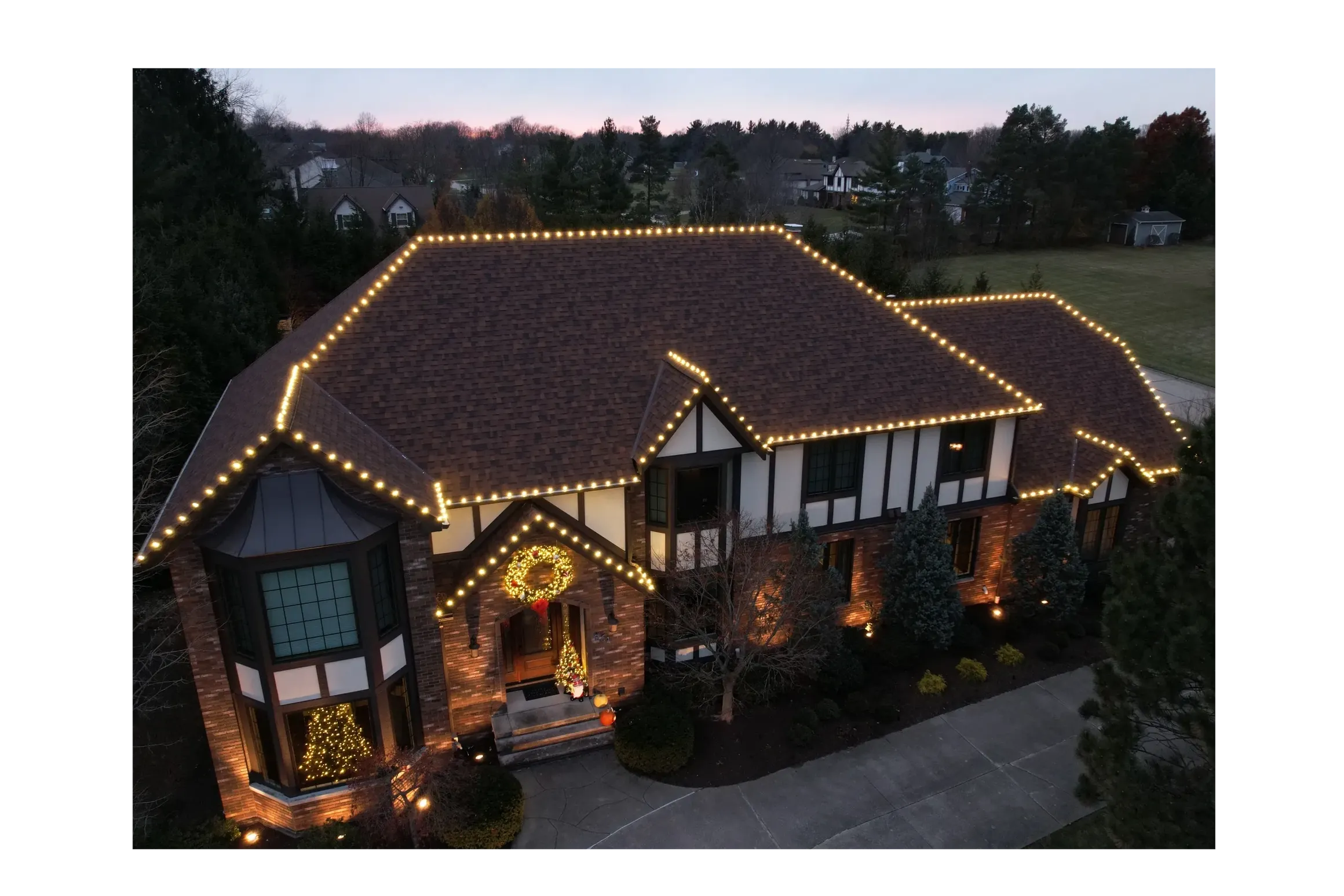 Custom Christmas lighting design highlighting architectural features