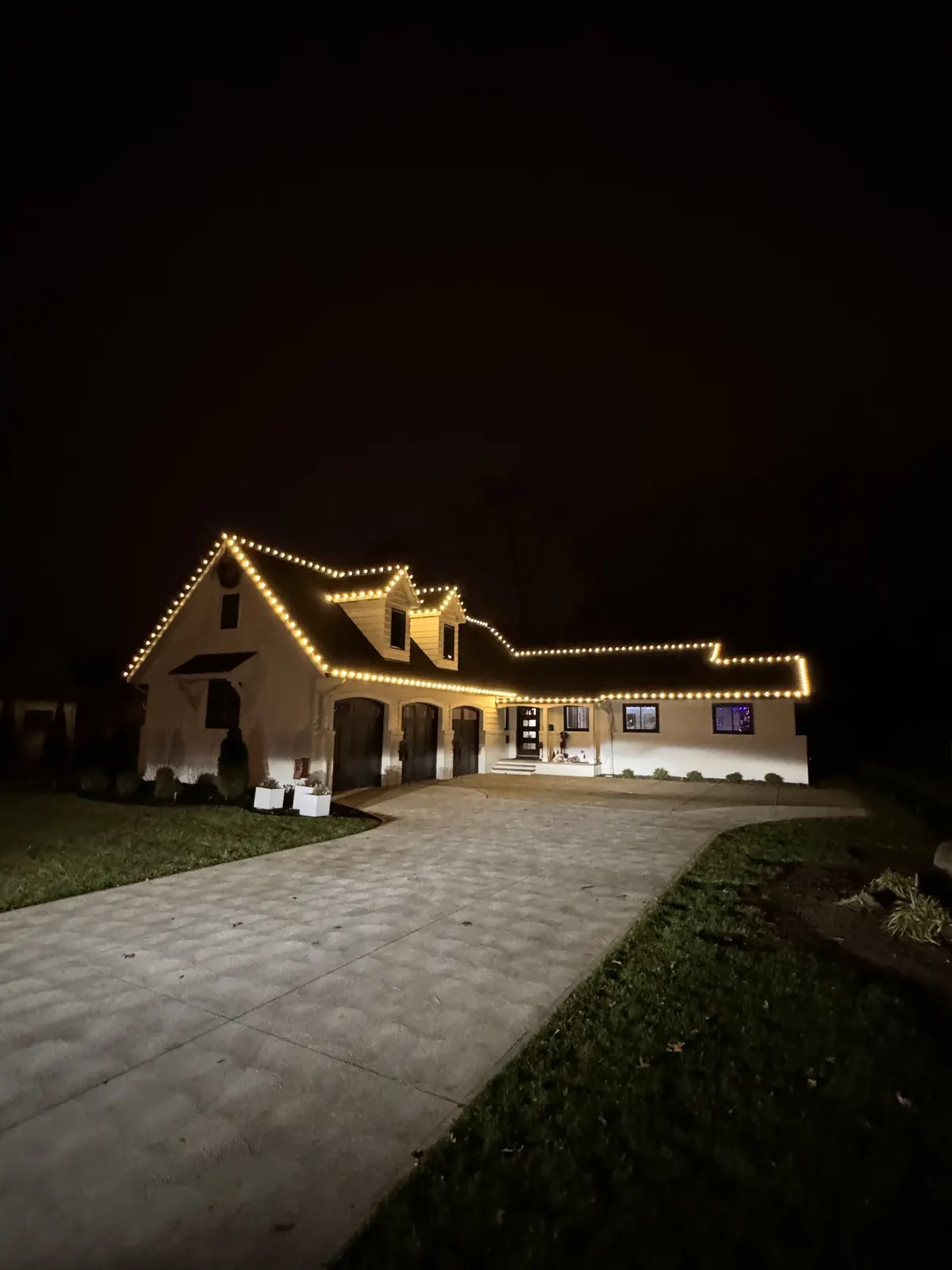 Christmas roofline lighting on a new-build home